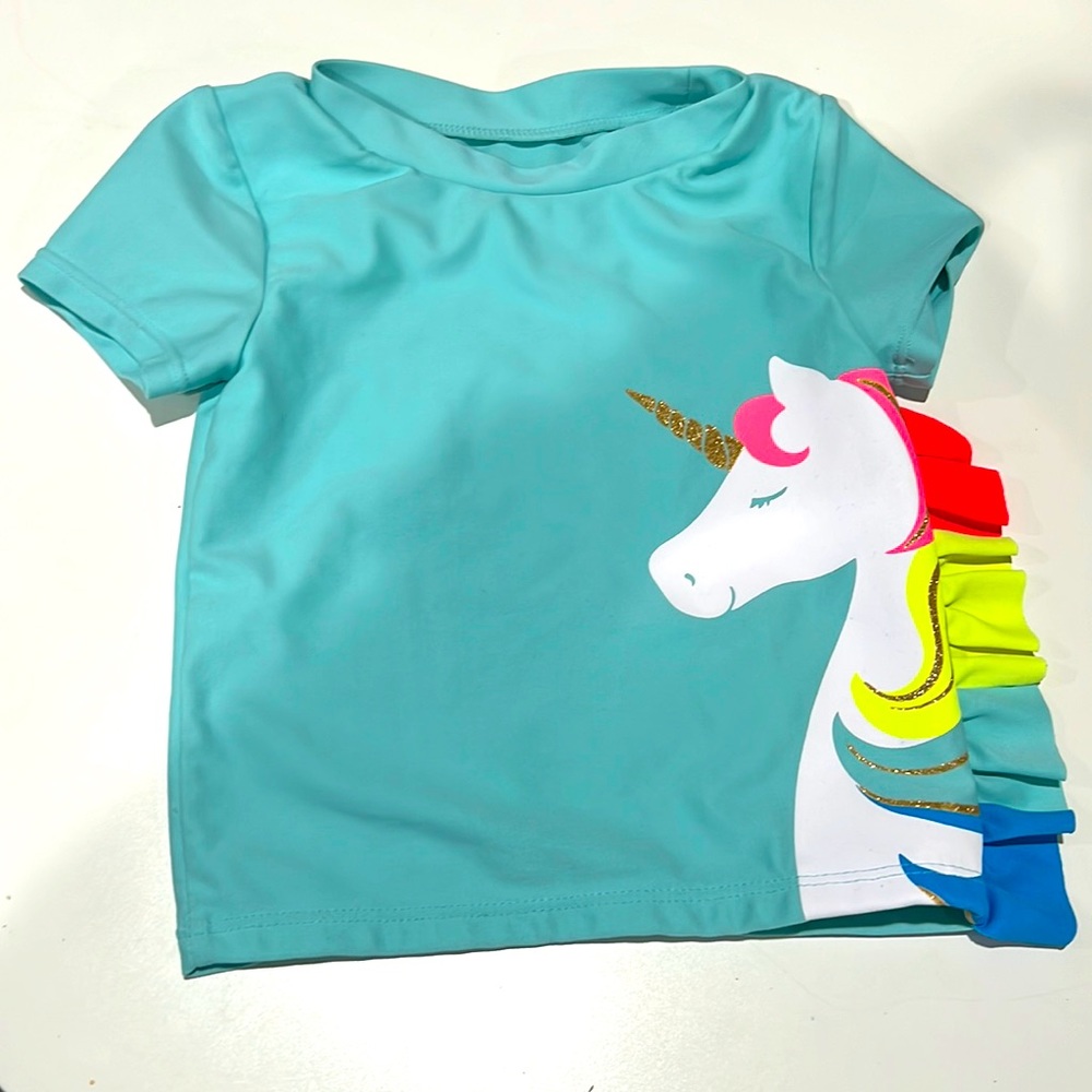 Kids’ Swim Shirt in Excellent Condition from a Smoke-Free and Pet-Free Home